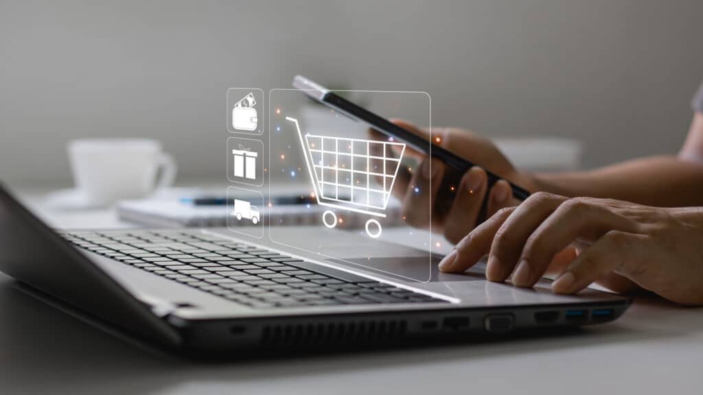 Holiday online shopping concept. user on laptops, smartphones and credit cards to purchase products from online stores and shop on the Internet, e-commerce stores. concept on a virtual screen.