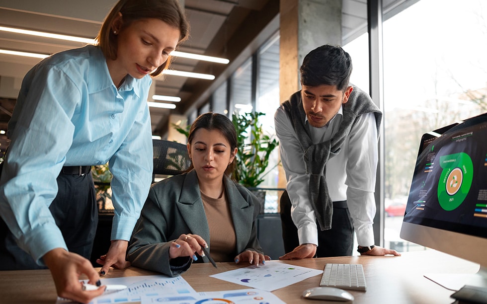 Team of marketing professionals reviewing data