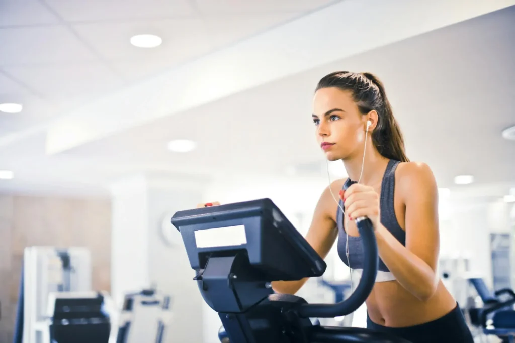 Woman working out while listening to audio